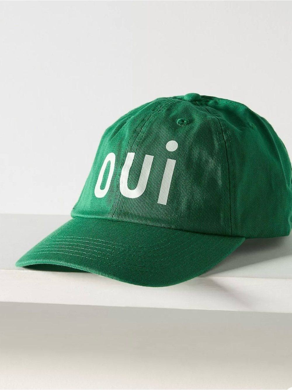 Anthropologie “OUI” trucker hat